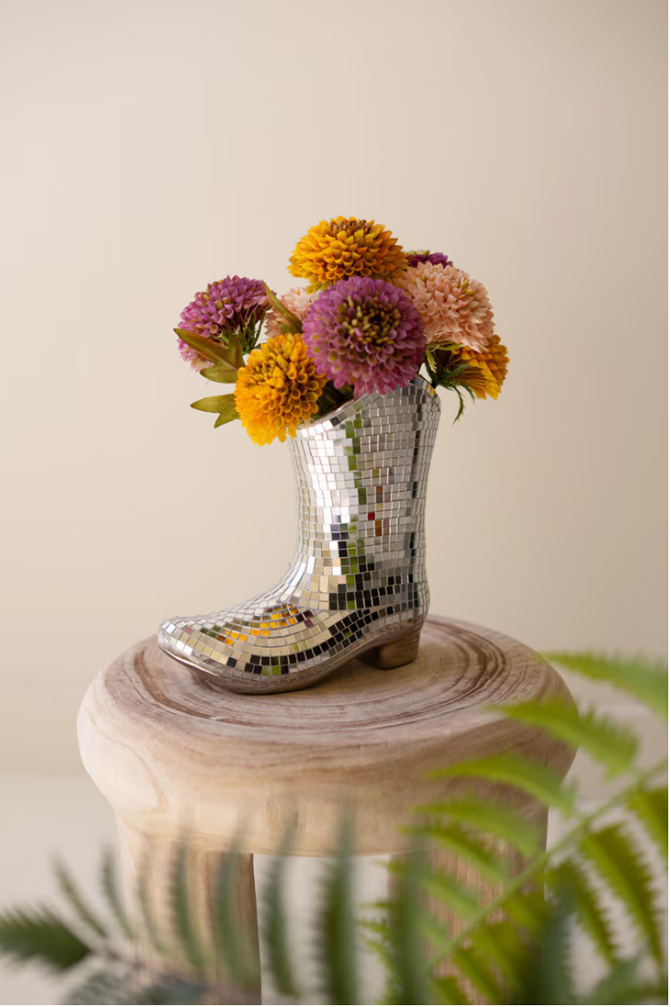 Ceramic Disco Boot Vase with flowers and light reflections