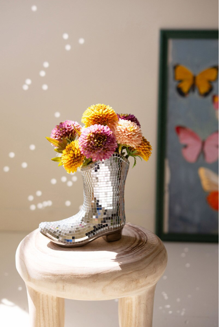 Ceramic Disco Boot Vase with colorful flowers, close view