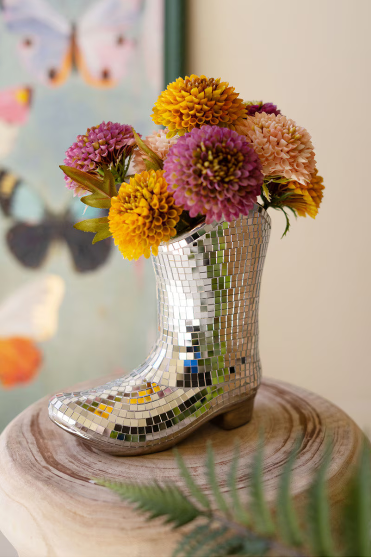 Ceramic Disco Boot Vase close-up on wood stand
