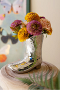 Ceramic Disco Boot Vase close-up on wood stand