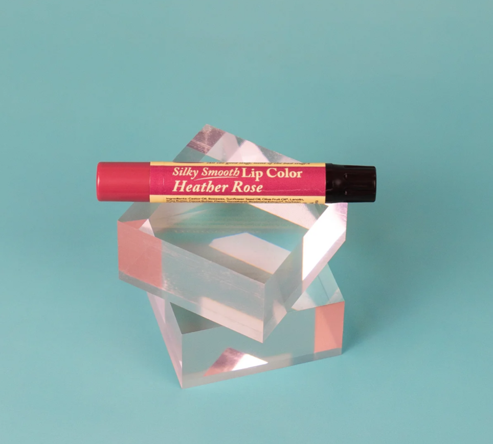 The Naked Bee Heather Rose Silky Smooth Lip Color tube on white background