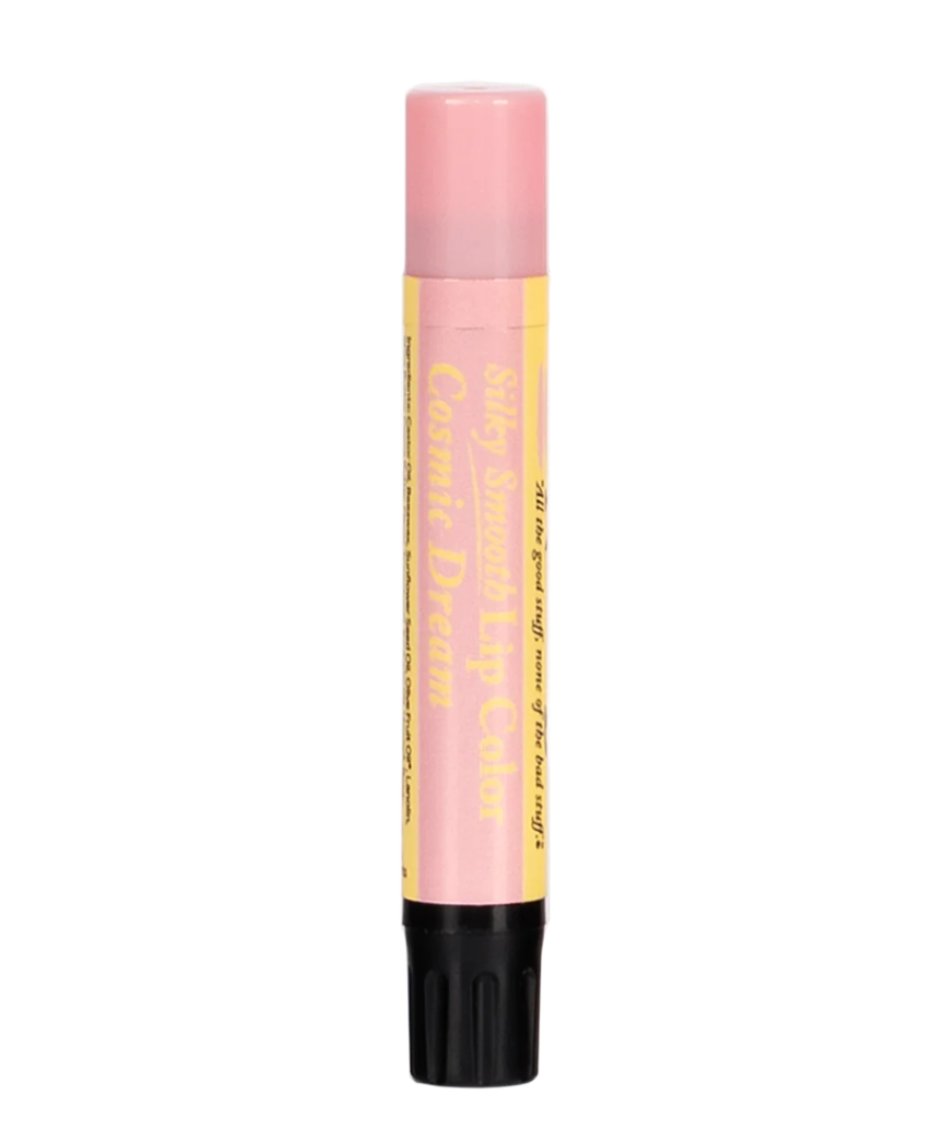 The Naked Bee Cosmic Dream Silky Smooth Lip Color on teal background