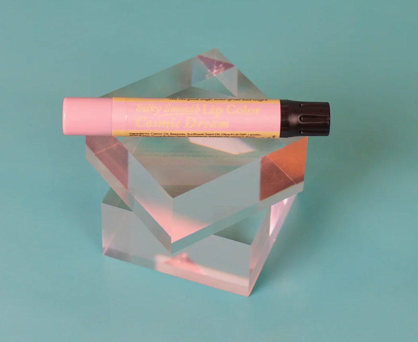 The Naked Bee Cosmic Dream Silky Smooth Lip Color tube on white background