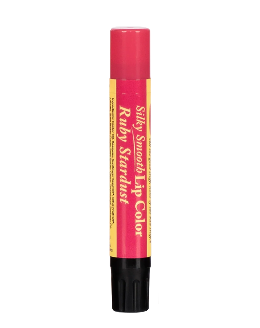 The Naked Bee Ruby Stardust Silky Smooth Lip Color on teal background
