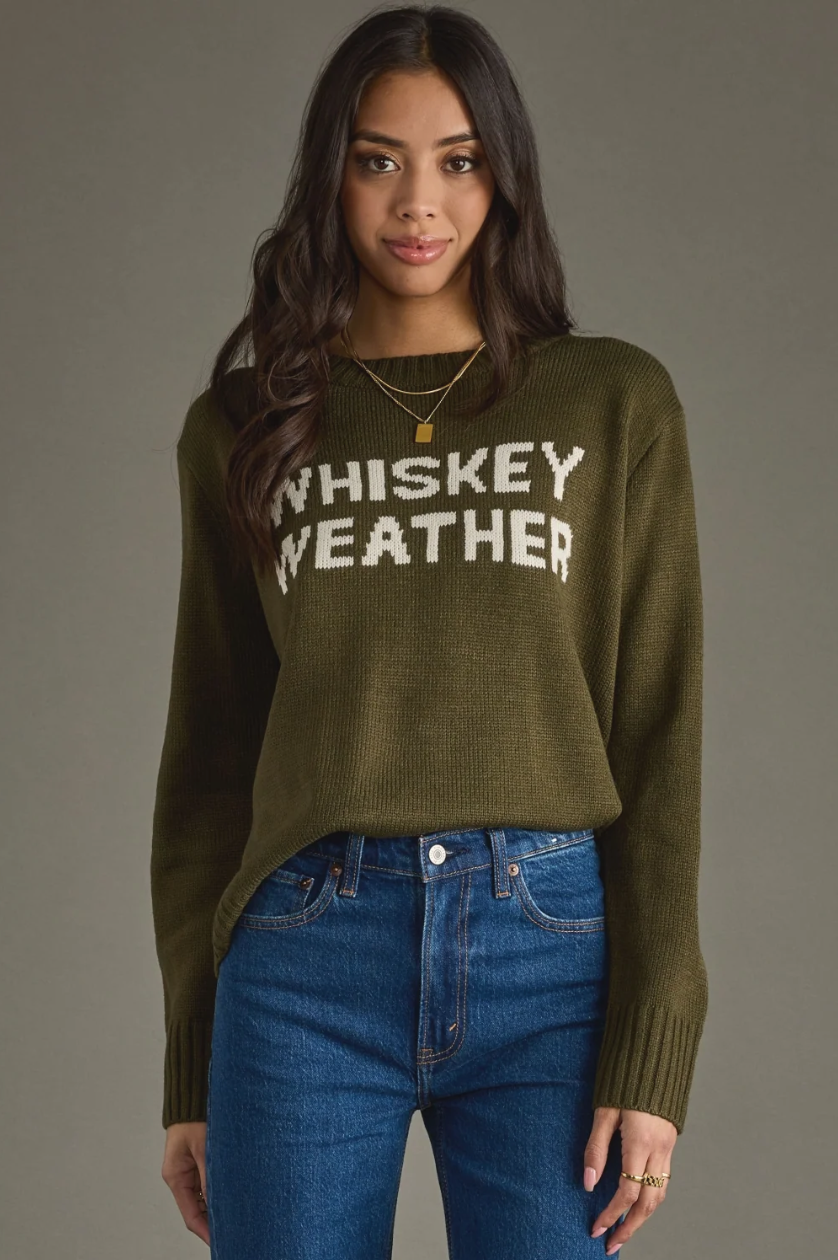 Model wearing an olive Whiskey Weather knit sweater, front view
