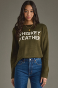 Model wearing an olive Whiskey Weather knit sweater, front view