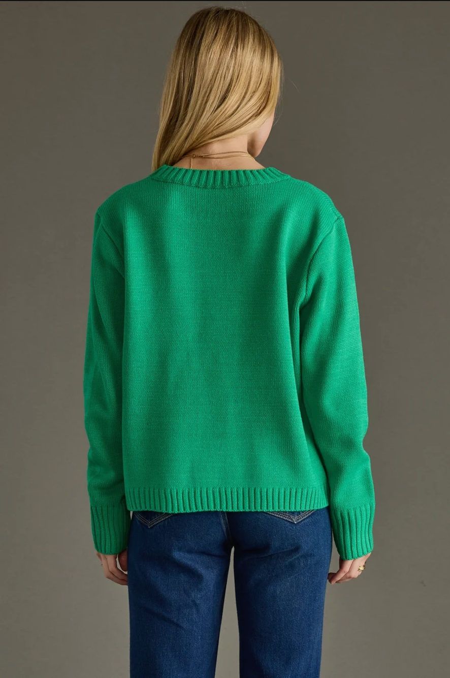 Back view of the kelly green knit sweater